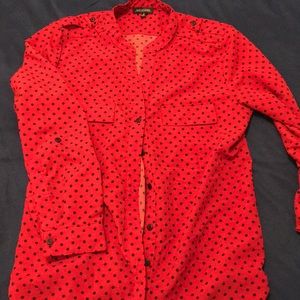 Red and black polka dot blouse